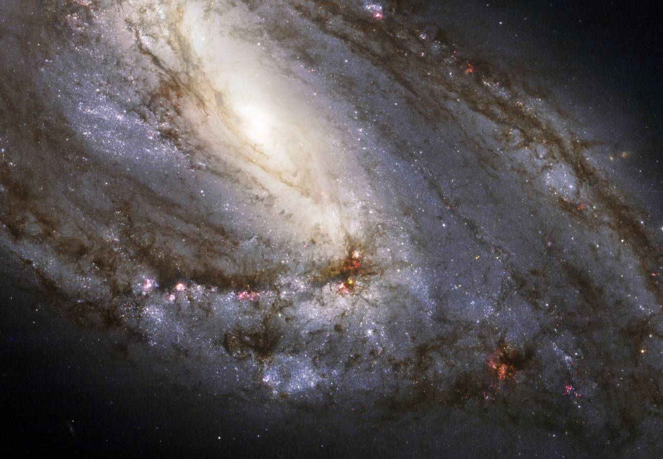 La belleza asimétrica de Messier 66