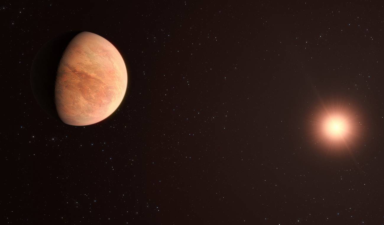 Recreación del exoplaneta L 98-59b con su estrella al fondo.