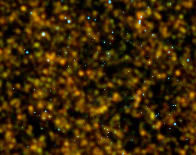 Imagen de una sección de cielo en la que se ven puntos azules que corresponden a galaxiaas activas